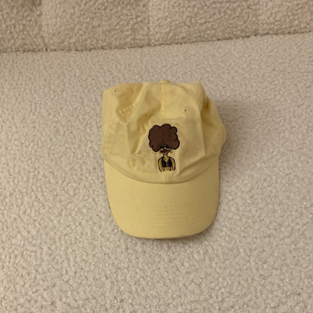 Yellow Cap with Afro Graphic